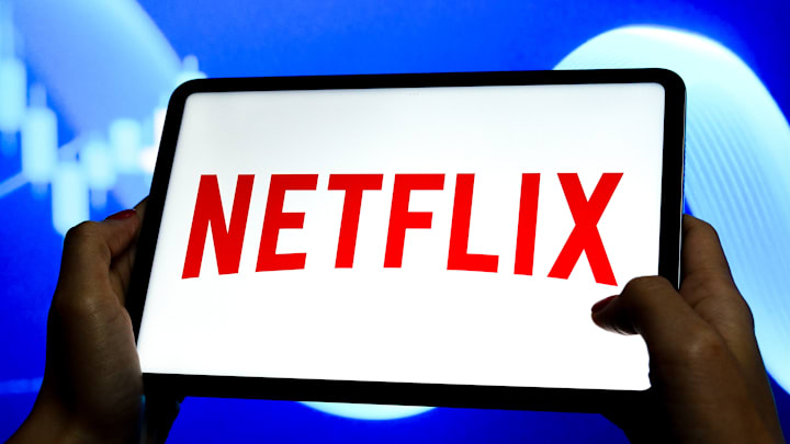 In this photo illustration, a Netflix logo is seen displayed...