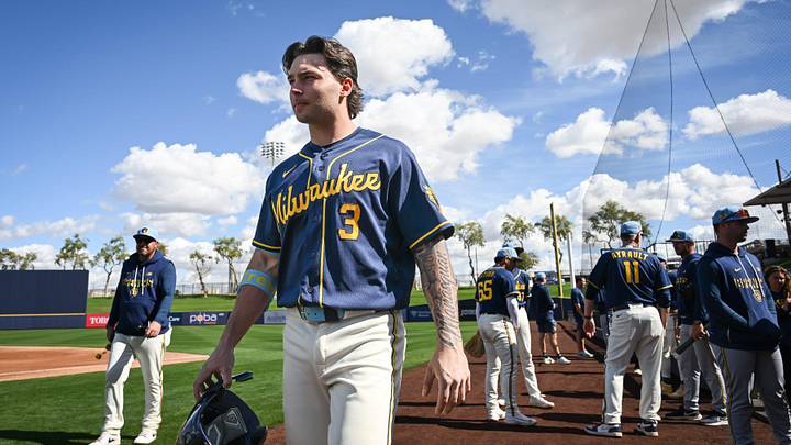 Milwaukee Brewers infield prospect Andrew Fischer walks across the field during spring training workouts Tuesday, February 17, 2026, at American Family Fields of Phoenix in Phoenix, Arizona.
