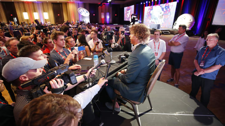 Ole Miss Rebels quarterback Jaxson Dart is surrounded by media members at SEC Media Days in Dallas on July 15, 2024. Ole Miss Rebels quarterback Jaxson Dart is surrounded by media members at SEC Media Days in Dallas on July 15, 2024.