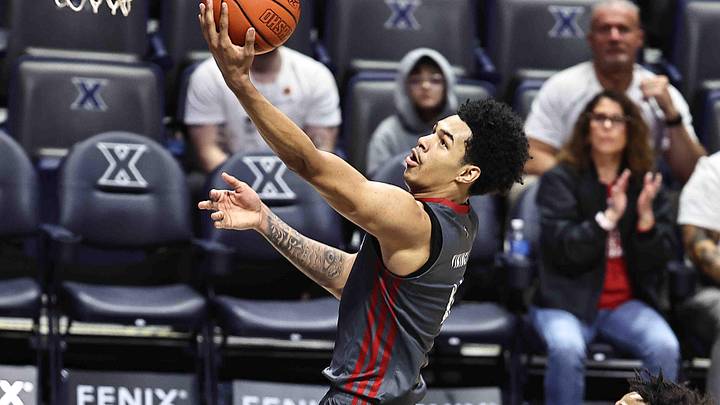 Princeton's Kam Mercer drives to the basket during their district championship game against Hamilton Saturday, March 7, 2026. Princeton's Kam Mercer drives to the basket during their district championship game against Hamilton Saturday, March 7, 2026.