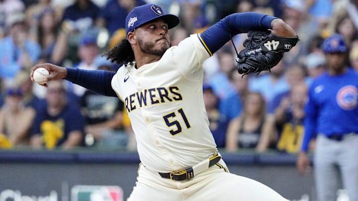 Oct 4, 2025; Milwaukee, Wisconsin, USA; Milwaukee Brewers starting pitcher Freddy Peralta (51) pitches against the Chicago Cubs during the second inning of game one of the NLDS round for the 2025 MLB playoffs at American Family Field. Mandatory Credit: Michael McLoone-Imagn Images Oct 4, 2025; Milwaukee, Wisconsin, USA; Milwaukee Brewers starting pitcher Freddy Peralta (51) pitches against the Chicago Cubs during the second inning of game one of the NLDS round for the 2025 MLB playoffs at American Family Field. Mandatory Credit: Michael McLoone-Imagn Images