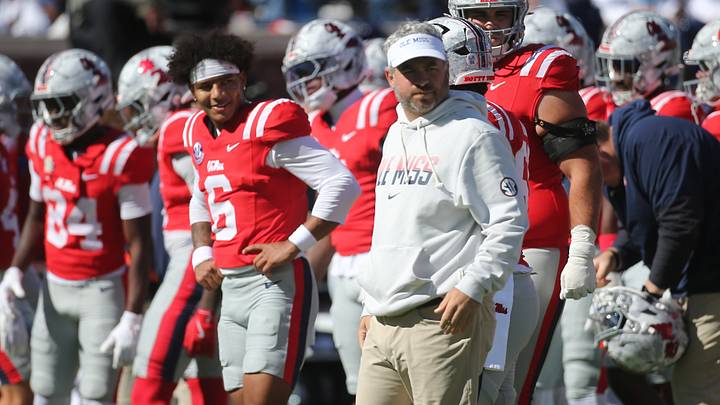 Oct 17, 2026; Oxford, Mississippi, USA;  Mississippi Rebels head coach Pete Golding and quarterback Trinidad Chambliss (6) look back before the game against the Missouri Tigers at Vaught-Hemingway Stadium.  Mandatory Credit: Petre Thomas-Imagn Images