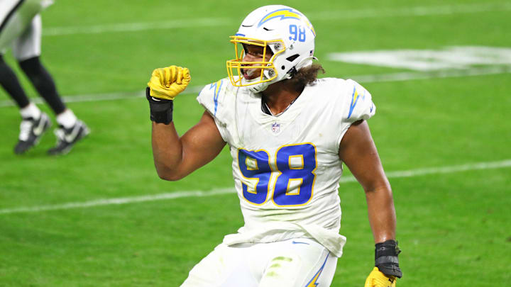 Los Angeles Chargers defensive end Isaac Rochell celebrates a play against the Las Vegas Raiders at Allegiant Stadium.