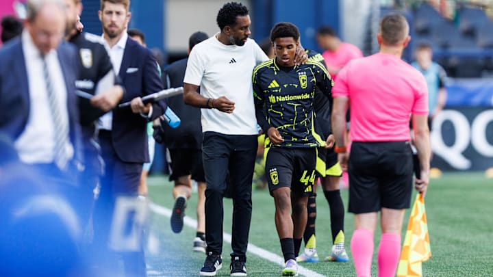 Jul 6, 2025; Seattle, Washington, USA; Columbus Crew head coach Wilfried Nancy speaks with Columbus Crew midfielder Tristan Brown (44) during the second half against Seattle Sounders FC at Lumen Field. Mandatory Credit: Kevin Ng-Imagn Images