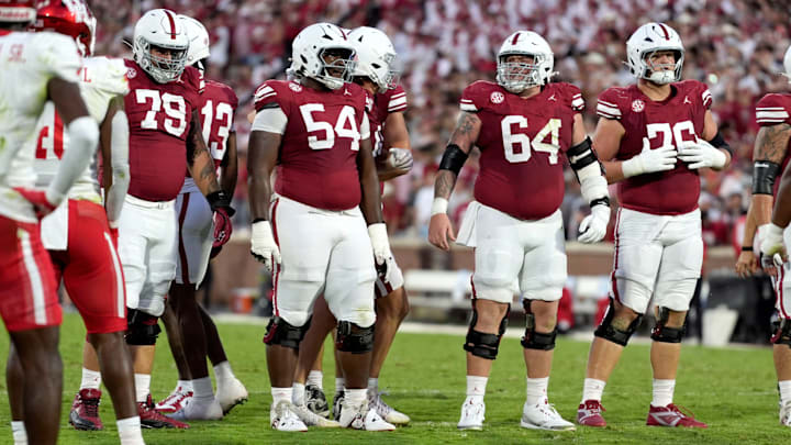 Oklahoma Sooners offensive lineman Jake Taylor (79), offensive lineman Febechi Nwaiwu (54), offensive lineman Joshua Bates (64) and offensive lineman Jacob Sexton (76) walk to the line during a college football game between the University of Oklahoma Sooners (OU) and the Houston Cougars at Gaylord Family–Ð Oklahoma Memorial Stadium in Norman, Okla., Saturday, Sept. 7, 2024.