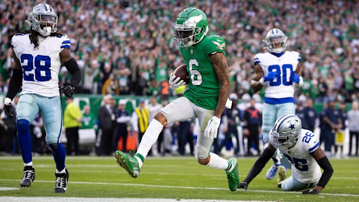 Philadelphia Eagles wide receiver DeVonta Smith runs past Dallas Cowboys cornerback DaRon Bland for a touchdown.