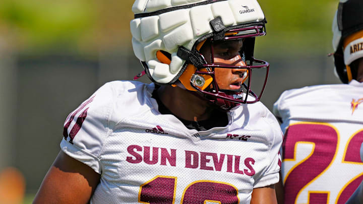 ASU linebacker Martell Hughes (18) warms up during practice in Tempe on July 31, 2024.
