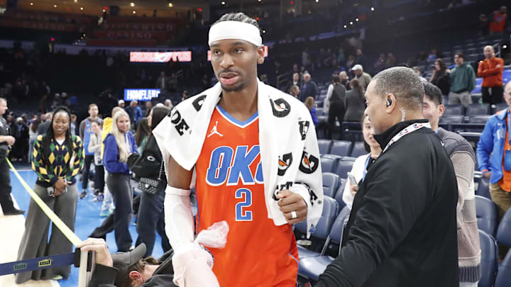 Jan 16, 2025; Oklahoma City, Oklahoma, USA; Oklahoma City Thunder guard Shai Gilgeous-Alexander (2) walks off the court after talking to a fan at the end of their game against the Cleveland Cavaliers at Paycom Center. Mandatory Credit: Alonzo Adams-Imagn Images