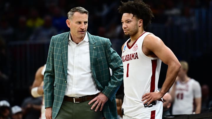 Mar 23, 2025; Cleveland, OH, USA; Alabama Crimson Tide head coach Nate Oats coaches guard Mark Sears (1) in the second half against the St. Mary's Gaels during the NCAA Tournament Second Round at Rocket Arena. Mandatory Credit: Ken Blaze-Imagn Images