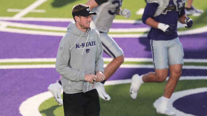 Kansas State head coach Collin Klein walks the field during practice on Tuesday, April 21, 2026.