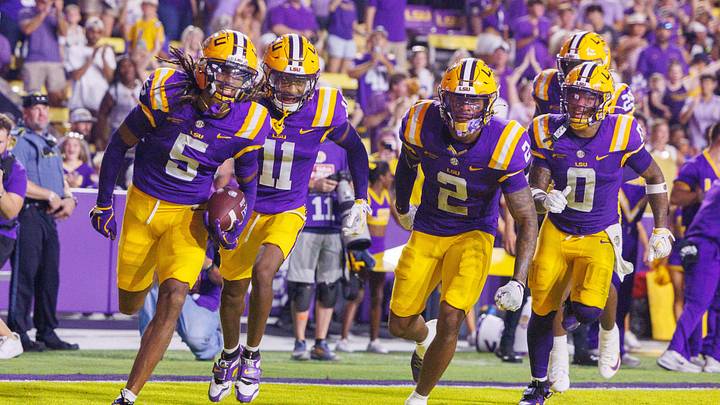 Sep 12, 2026; Baton Rouge, Louisiana, USA; LSU Tigers cornerback DJ Pickett (5) intercepts a pass against Louisiana Tech Bulldogs during the second half at Tiger Stadium. Mandatory Credit: Stephen Lew-Imagn Images Sep 12, 2026; Baton Rouge, Louisiana, USA; LSU Tigers cornerback DJ Pickett (5) intercepts a pass against Louisiana Tech Bulldogs during the second half at Tiger Stadium. Mandatory Credit: Stephen Lew-Imagn Images