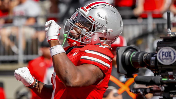 Sep 21, 2024; Columbus, Ohio, USA;  Ohio State Buckeyes running back Quinshon Judkins (1) celebrates his touchdown during the third quarter against the Marshall Thundering Herd at Ohio Stadium.