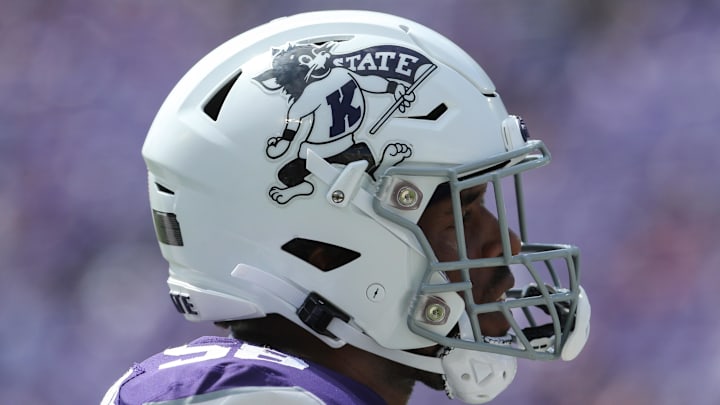 Sep 17, 2022; Manhattan, Kansas, USA; Kansas State Wildcats defensive end Cartez Crook-Jones (58) and the Wildcats wear throw-back logos on their helmets during the game against the Tulane Green Wave at Bill Snyder Family Football Stadium. Sep 17, 2022; Manhattan, Kansas, USA; Kansas State Wildcats defensive end Cartez Crook-Jones (58) and the Wildcats wear throw-back logos on their helmets during the game against the Tulane Green Wave at Bill Snyder Family Football Stadium.
