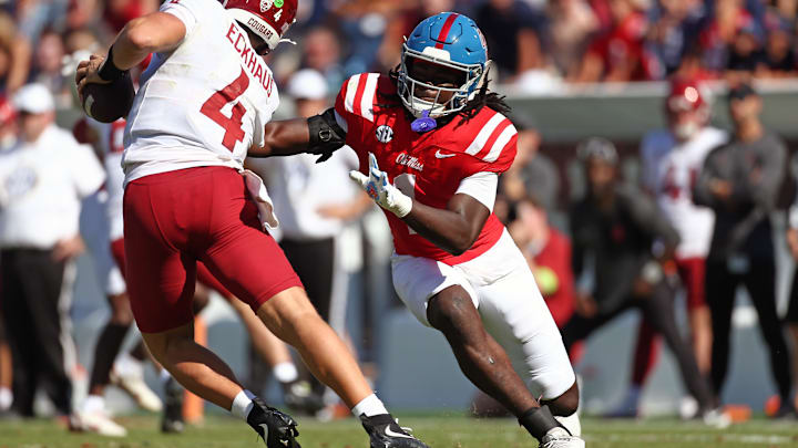 Oct 11, 2025; Oxford, Mississippi, USA; Mississippi Rebels linebacker Princewill Umanmielen (1) sacks Washington State Cougars quarterback Zevi Eckhaus (4) during the fourth quarter at Vaught-Hemingway Stadium. Mandatory Credit: Petre Thomas-Imagn Images