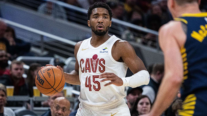 Jan 14, 2025; Indianapolis, Indiana, USA;  Cleveland Cavaliers guard Donovan Mitchell (45) dribble the ball in the first half against the Indiana Pacers  at Gainbridge Fieldhouse. Mandatory Credit: Trevor Ruszkowski-Imagn Images
