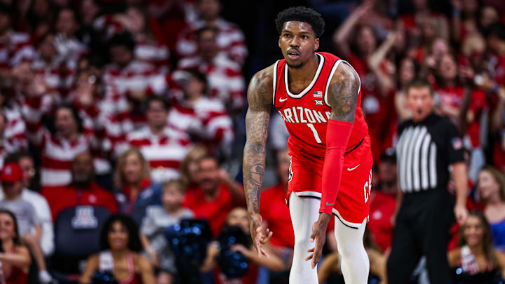 Feb 22, 2025; Tucson, Arizona, USA; Arizona Wildcats guard Caleb Love (1) holds out a three after he makes a three-point basket during the first half against the BYU Cougars at McKale Center. Mandatory Credit: Aryanna Frank-Imagn Images