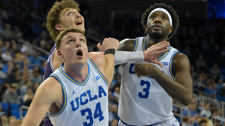 Jan 24, 2026; Los Angeles, California, USA;  UCLA Bruins forward Tyler Bilodeau (34) and guard Eric Dailey Jr. (3) box out Northwestern Wildcats forward Nick Martinelli (2) in the second half at Pauley Pavilion presented by Wescom Financial. Mandatory Credit: Jayne Kamin-Oncea-Imagn Images