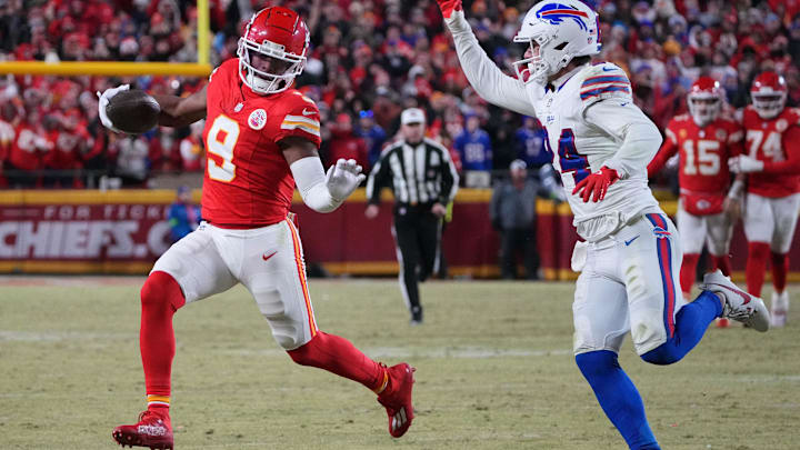 Jan 26, 2025; Kansas City, MO, USA; Kansas City Chiefs wide receiver JuJu Smith-Schuster (9) makes a catch against Buffalo Bills safety Cole Bishop (24) during the second half in the AFC Championship game at GEHA Field at Arrowhead Stadium. Mandatory Credit: Denny Medley-Imagn Images