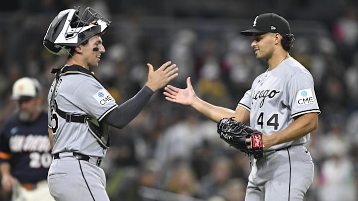 May 1, 2026; San Diego, California, USA; Chicago White Sox catcher Drew Romo (36), left, and pitcher Jordan Hicks (44) celebrate after the Chicago White Sox defeated the San Diego Padres at Petco Park. Mandatory Credit: Denis Poroy-Imagn Images