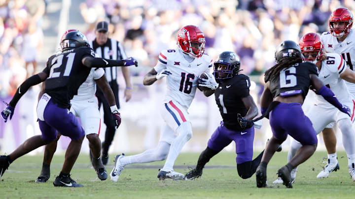 Nov 23, 2024; Fort Worth, Texas, USA; Arizona Wildcats wide receiver Chris Hunter (16) runs the ball against the TCU Horned Frogs in the second quarter at Amon G. Carter Stadium. Mandatory Credit: Tim Heitman-Imagn Images