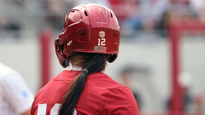 Oklahoma infielder Lexi McDaniel looks back toward the dugout after reaching base against Kentucky. Oklahoma infielder Lexi McDaniel looks back toward the dugout after reaching base against Kentucky.