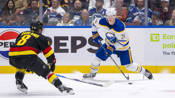 Mar 19, 2024; Vancouver, British Columbia, CAN; Vancouver Canucks forward Conor Garland (8) watches