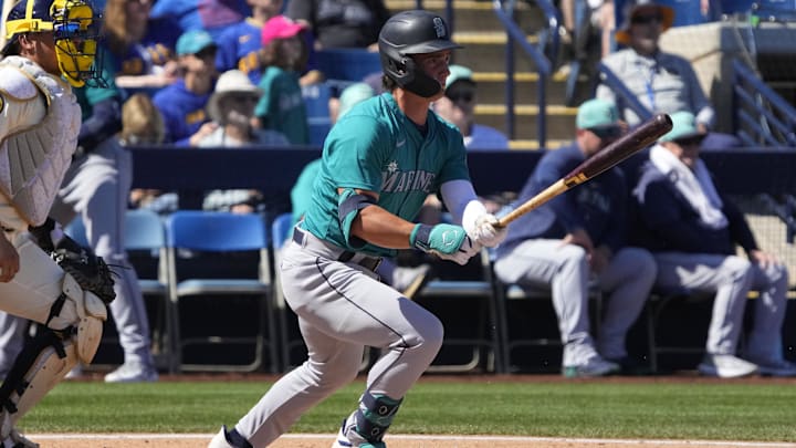 Seattle Mariners second baseman Cole Young hits during a spring training game against the Milwaukee Brewers on March 9 at American Family Fields of Phoenix.