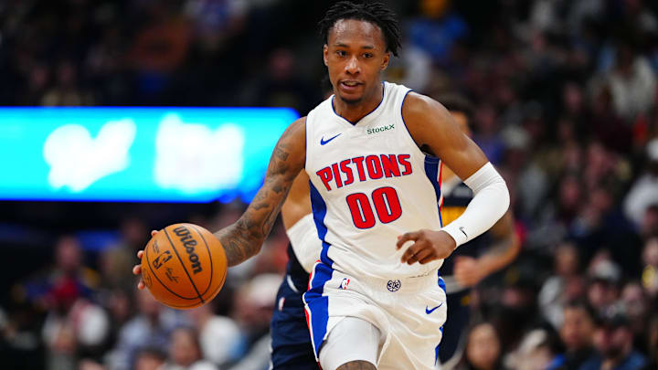 Dec 28, 2024; Denver, Colorado, USA; Detroit Pistons forward Ronald Holland II (00) dribbles up court in the second half against the Denver Nuggets at Ball Arena.