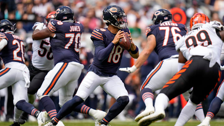 Bears quarterback Caleb Williams (18) drops back to throw against the Bengals in a 2024 preseason game.