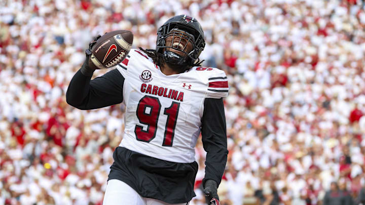 Oct 19, 2024; Norman, Oklahoma, USA;  South Carolina Gamecocks defensive tackle Tonka Hemingway (91) reacts after returning a fumble for a touchdown during the first half against the Oklahoma Sooners at Gaylord Family-Oklahoma Memorial Stadium. Mandatory Credit: Kevin Jairaj-Imagn Images