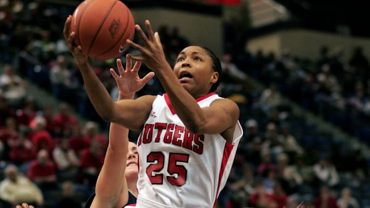 March 5, 2006; Hartford, CT, USA; Rutgers Scarlet Knights (25) Cappie Pondexter in for the layup past Villanova Wildcats (35) Jackie Adamshick in the 2nd half of play at the Civic Center. Mandatory Credit: David Butler II-Imagn Images Copyright © David Butler II 2006 March 5, 2006; Hartford, CT, USA; Rutgers Scarlet Knights (25) Cappie Pondexter in for the layup past Villanova Wildcats (35) Jackie Adamshick in the 2nd half of play at the Civic Center. Mandatory Credit: David Butler II-Imagn Images Copyright © David Butler II 2006