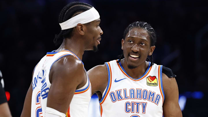 Nov 20, 2024; Oklahoma City, Oklahoma, USA; Oklahoma City Thunder forward Jalen Williams (8) and guard Shai Gilgeous-Alexander (2) talk during a time out against the Portland Trail Blazers at Paycom Center. Mandatory Credit: Alonzo Adams-Imagn Images