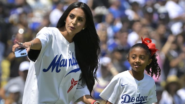 Vanessa Bryant, widow of Los Angeles Lakers Kobe Bryant, accompanies their daughter Bianka, 7, to the mound to throw out the first pitch against the Tampa Bay Rays on Sunday, Aug. 25 at Dodger Stadium. Vanessa Bryant, widow of Los Angeles Lakers Kobe Bryant, accompanies their daughter Bianka, 7, to the mound to throw out the first pitch against the Tampa Bay Rays on Sunday, Aug. 25 at Dodger Stadium.