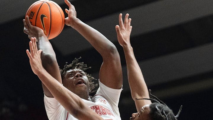 Feb 14, 2026; Tuscaloosa, AL, USA; Alabama forward Aiden Sherrell (22) shoots over South Carolina guard Kobe Knox (4) at Coleman Coliseum. Mandatory Credit: Gary Cosby Jr.-Tuscaloosa News Feb 14, 2026; Tuscaloosa, AL, USA; Alabama forward Aiden Sherrell (22) shoots over South Carolina guard Kobe Knox (4) at Coleman Coliseum. Mandatory Credit: Gary Cosby Jr.-Tuscaloosa News