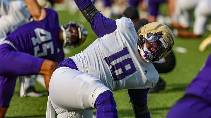 Kai McClendon , shown stretching, had his first team snaps with the UW on Tuesday. Kai McClendon , shown stretching, had his first team snaps with the UW on Tuesday.