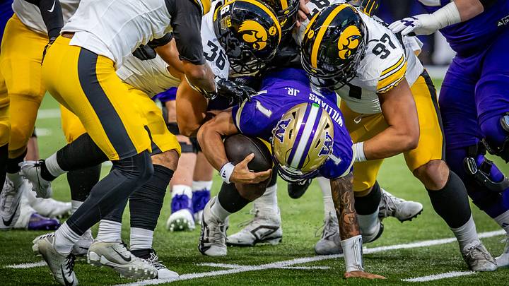 Demond Williams gets buried by Iowa defenders. Demond Williams gets buried by Iowa defenders.