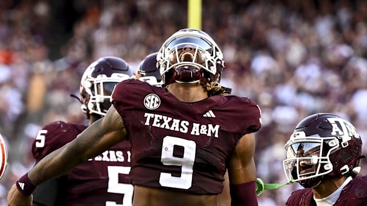 Sep 27, 2025; College Station, Texas, USA; Texas A&M Aggies defensive end Cashius Howell (9) reacts after a sack during the fourth quarter against the Auburn Tigers at Kyle Field. Mandatory Credit: Maria Lysaker-Imagn Images