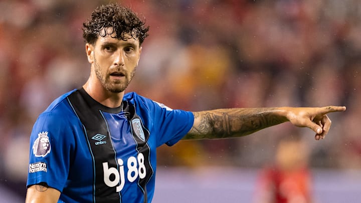 Marcos Senesi was subject to a controversial refereeing decision in the first half against Liverpool.