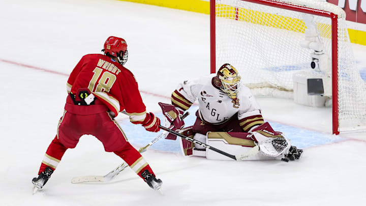 Boston College's Jacob Fowler makes a save against Denver's Jared Wright in the 2024 men's national championship.