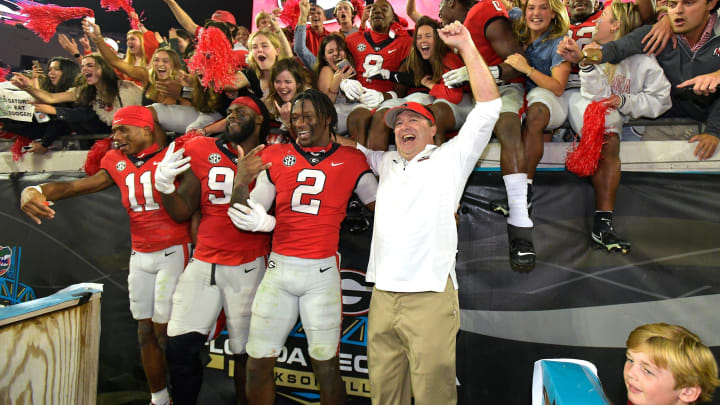 Georgia Bulldogs head coach Kirby Smart celebrates with his players and fans after their victory over Florida. The annual Georgia vs Florida football rivalry was held at TIAA Bank Field in Jacksonville, FL Saturday, October 29, 2022. The Bulldogs went in at halftime with a 28 to 3 lead over the Gators and won with a final score of 42 to 20. [Bob Self/Florida Times-Union]

Jki 102822 Bs Georgia Vs Florida Football Game 2nd Half 06