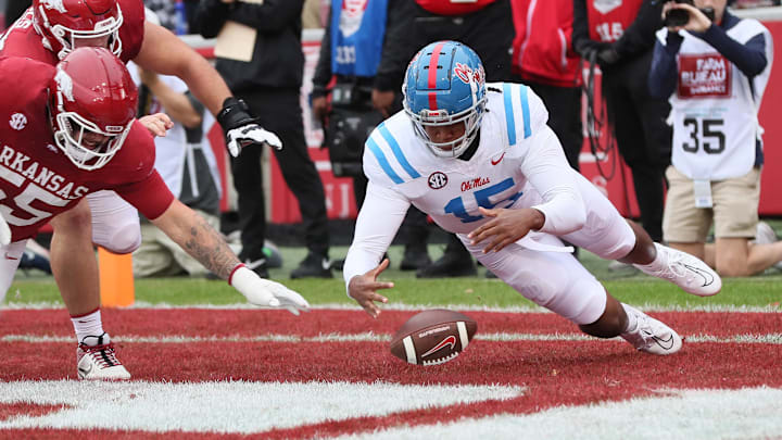Nov 2, 2024; Fayetteville, Arkansas, USA; Ole Miss Rebels defensive end Jared Ivey (15) falls on a loose ball in the end zone for a touchdown in the first quarter against the Arkansas Razorbacks at Donald W. Reynolds Razorback Stadium. Mandatory Credit: Nelson Chenault-Imagn Images