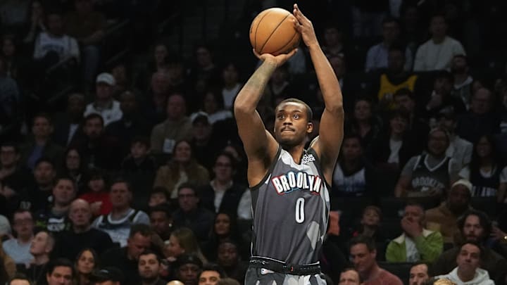 Apr 3, 2025; Brooklyn, New York, USA; Brooklyn Nets forward Dariq Whitehead (0) shoots a three point jump shot against the Minnesota Timberwolves during the first half at Barclays Center. Mandatory Credit: Gregory Fisher-Imagn Images