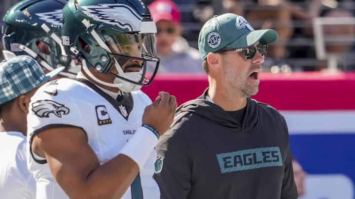 Oct 20, 2024; East Rutherford, New Jersey, USA;  Philadelphia Eagles quarterback Jalen Hurts (1) and head coach Nick Sirianni pregame against the New York Giants at MetLife Stadium. Mandatory Credit: Robert Deutsch-Imagn Images