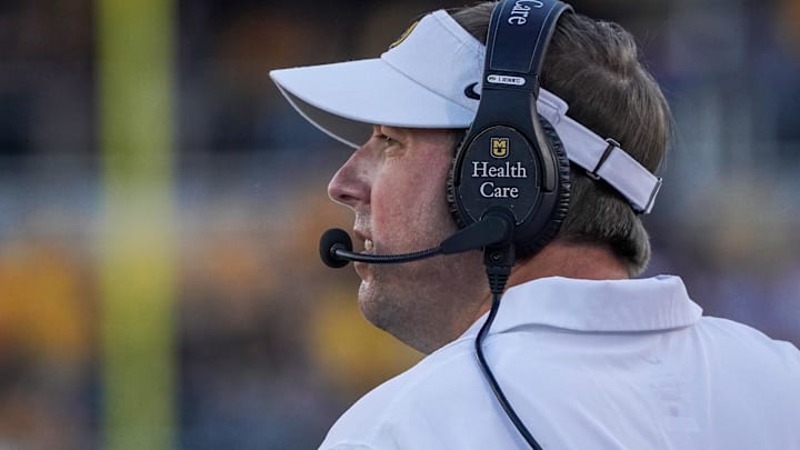 Aug 31, 2023; Columbia, Missouri, USA; Missouri Tigers head coach Eli Drinkwitz watches play against the South Dakota Coyotes during the first half at Faurot Field at Memorial Stadium. Mandatory Credit: Denny Medley-Imagn Images Aug 31, 2023; Columbia, Missouri, USA; Missouri Tigers head coach Eli Drinkwitz watches play against the South Dakota Coyotes during the first half at Faurot Field at Memorial Stadium. Mandatory Credit: Denny Medley-Imagn Images