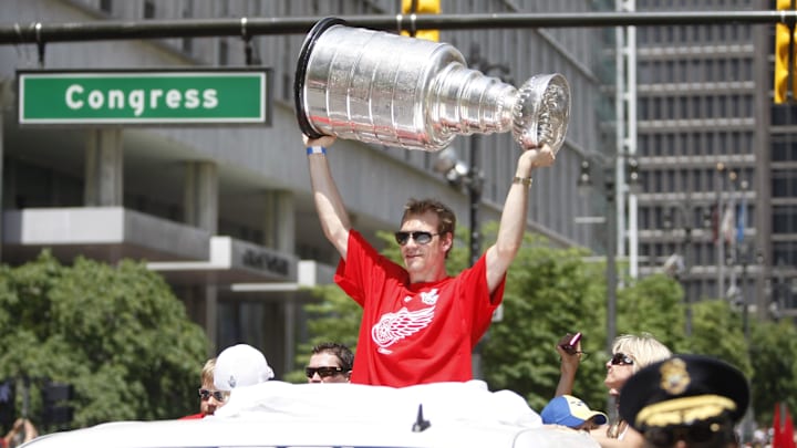June 6, 2008; Detroit, MI, USA; Detroit Red Wings captain Nicklas Lidstrom (5) holds the Stanley Cup during the  Stanley Cup championship victory parade. Mandatory Credit: Leon Halip-Imagn Images