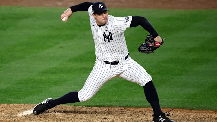 Oct 28, 2024; New York, New York, USA; New York Yankees pitcher Tommy Kahnle (41) throws during the eighth inning against the Los Angeles Dodgers in game three of the 2024 MLB World Series at Yankee Stadium. Mandatory Credit: Vincent Carchietta-Imagn Images