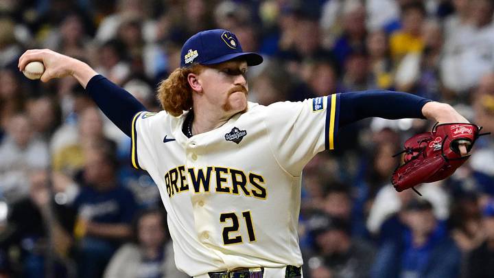 Oct 24, 2026; Milwaukee, Wisconsin, USA; Milwaukee Brewers pitcher Dustin May (21) throws a pitch against the Tampa Bay Rays during the fifth inning in game two of the 2026 World Series at American Family Field. Mandatory Credit: Benny Sieu-Imagn Images Oct 24, 2026; Milwaukee, Wisconsin, USA; Milwaukee Brewers pitcher Dustin May (21) throws a pitch against the Tampa Bay Rays during the fifth inning in game two of the 2026 World Series at American Family Field. Mandatory Credit: Benny Sieu-Imagn Images