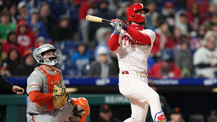 Apr 16, 2025; Philadelphia, Pennsylvania, USA; Philadelphia Phillies infielder Bryce Harper (3) hits a two-run home run against the San Francisco Giants in the fourth inning at Citizens Bank Park. 