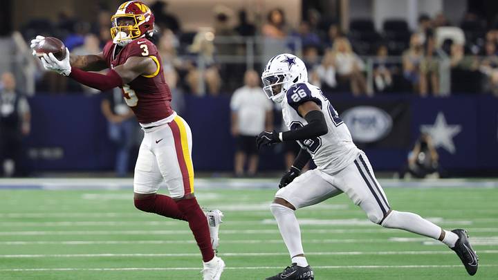 Washington Commanders wide receiver Stefon Diggs (3) extends for a pass thrown by quarterback Marcus Mariota (not pictured) against Dallas Cowboys cornerback DaRon Bland (26) during the second half at AT&T Stadium. Mandatory Credit: Kevin Jairaj-Imagn Images Washington Commanders wide receiver Stefon Diggs (3) extends for a pass thrown by quarterback Marcus Mariota (not pictured) against Dallas Cowboys cornerback DaRon Bland (26) during the second half at AT&T Stadium. Mandatory Credit: Kevin Jairaj-Imagn Images