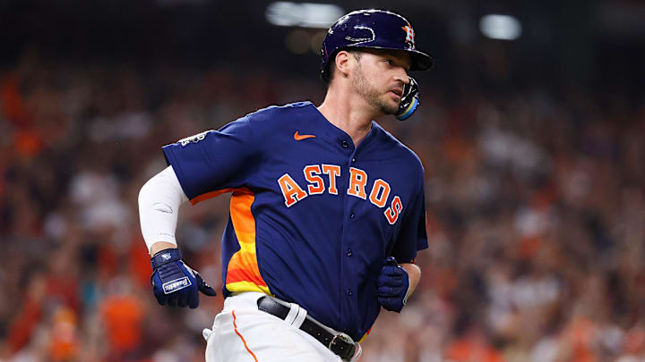 Nov 5, 2022; Houston, Texas, USA; Houston Astros first baseman Trey Mancini (26) runs to first after hitting a single against the Philadelphia Phillies during the third inning in game six of the 2022 World Series at Minute Maid Park
